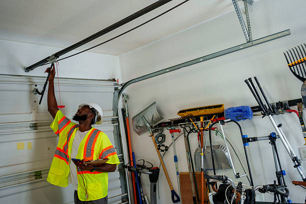 Professional Garage Door Panel Replacement technician working in West Babylon, NY